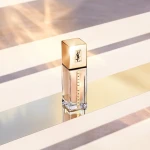 Yves Saint Laurent Touche Eclat Le Teint Тональна основа для обличчя, з ефектом сяйва - фото N2