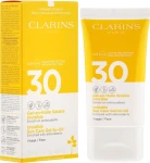 Clarins Сонцезахисний гель для обличчя Gel-en-Huile Solaire Invisible Visage SPF 30